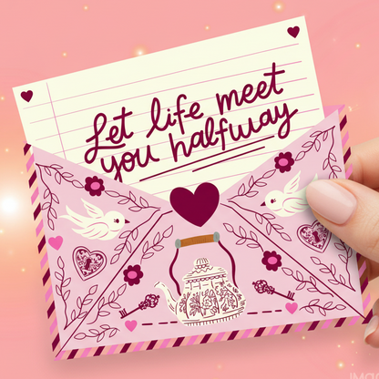 Decorative card with 'Let life meet you halfway' text on a pink background