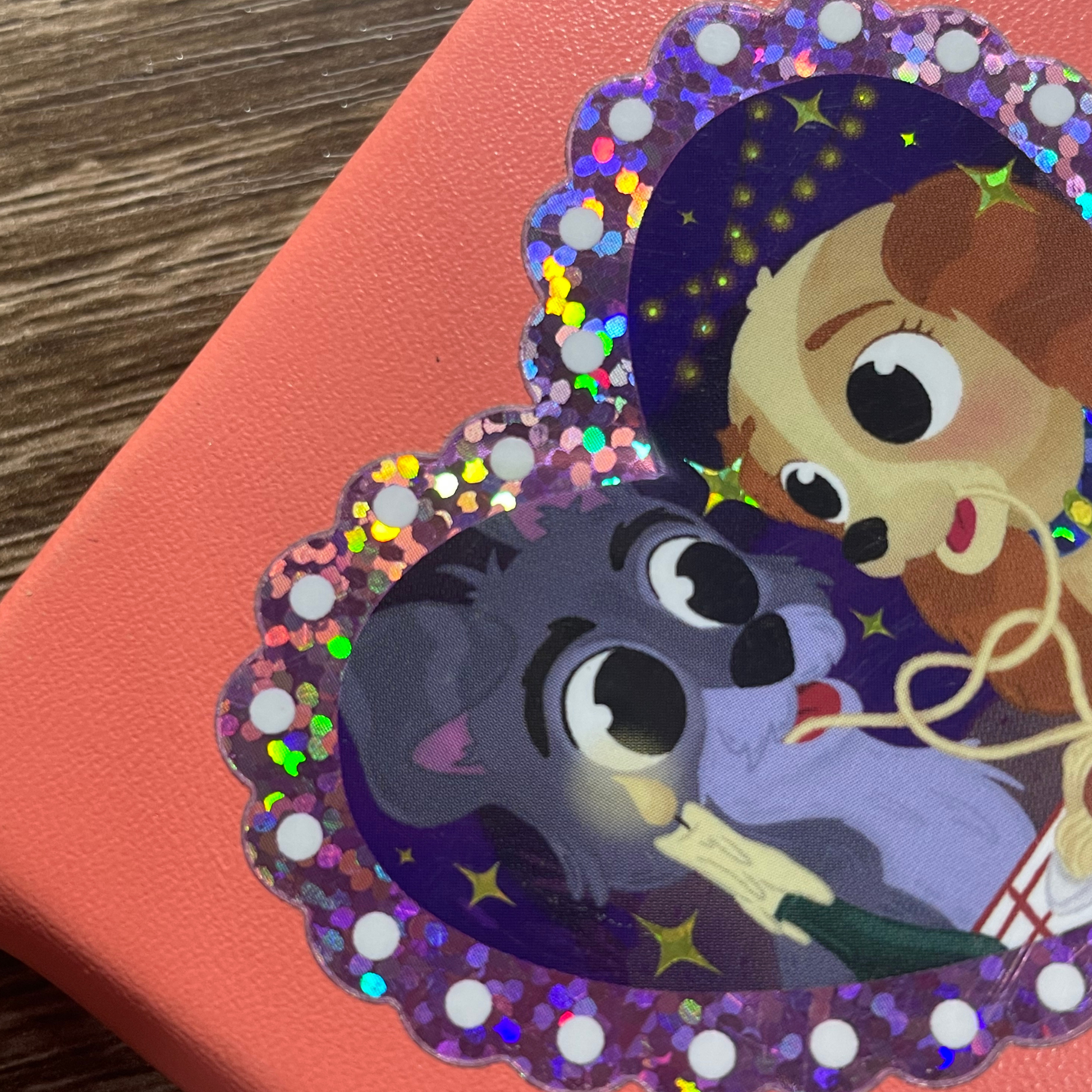 Sticker of a cartoon character and a dog on a glittery background