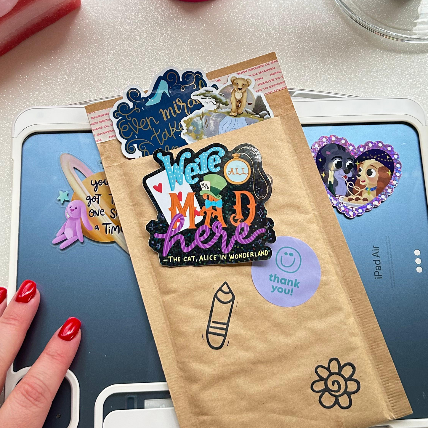 Alice in Wonderland Waterproof Sticker – We're Mad Here – Glitter Glossy Effect